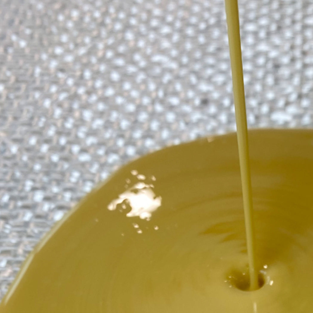 Mixed silicate sanikom resin been poured on to CRF fibreglass liner for pipe relining, cipp and patching of pipes